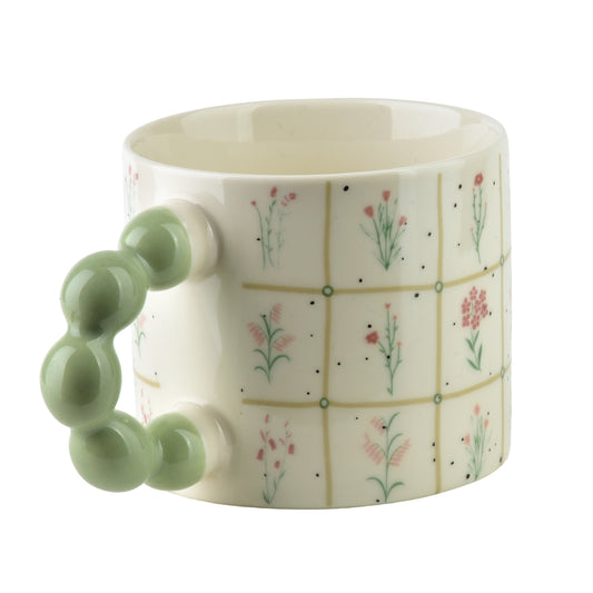 NARIA Becher 350 ml, Blumenmuster, Pastellgrün-Rosa – Detailansicht